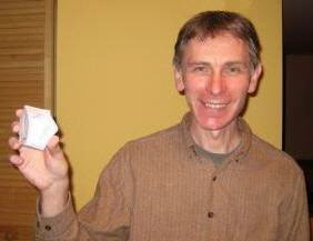 Author is showing the first model of the seed of our goodness